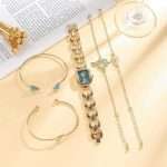 Code: CH-2627 Gold 5-Piece Iced-Out Women's Watch & Bracelet Set Stylish Diamond Design for a Glamorous Touch - Image 4